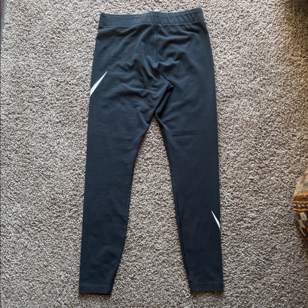 Nike Logo Slim Fit Mid-Rise Leggings - Picture 8 of 8